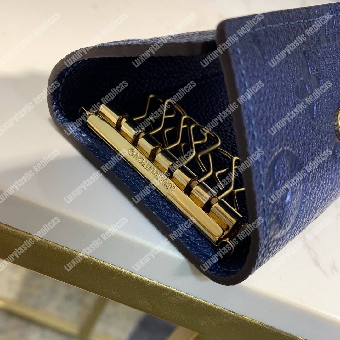 LV 6 KEY HOLDER Monogram Empreinte leather Iris