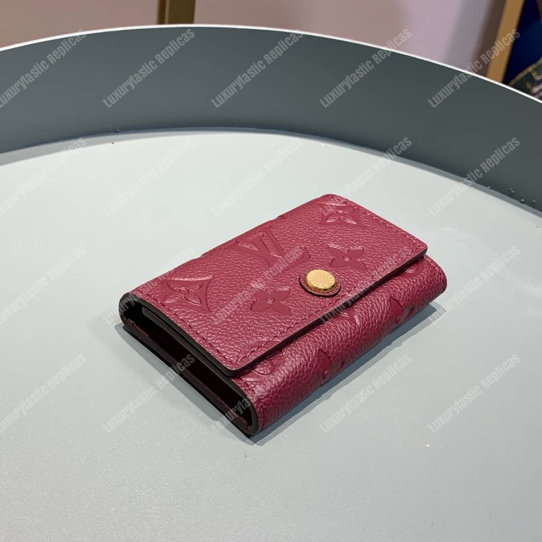 LV 6 KEY HOLDER Monogram Empreinte leather Aurore