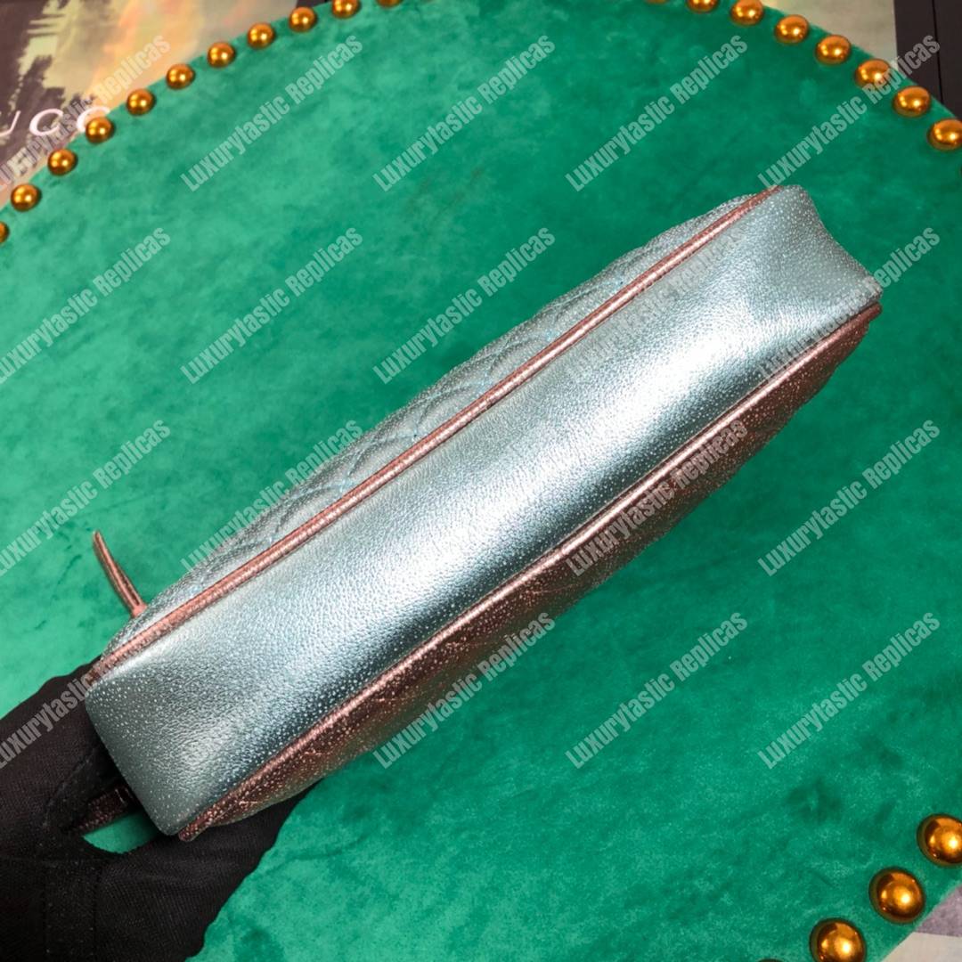 G*u*i zumi clutch metallic blue/pink