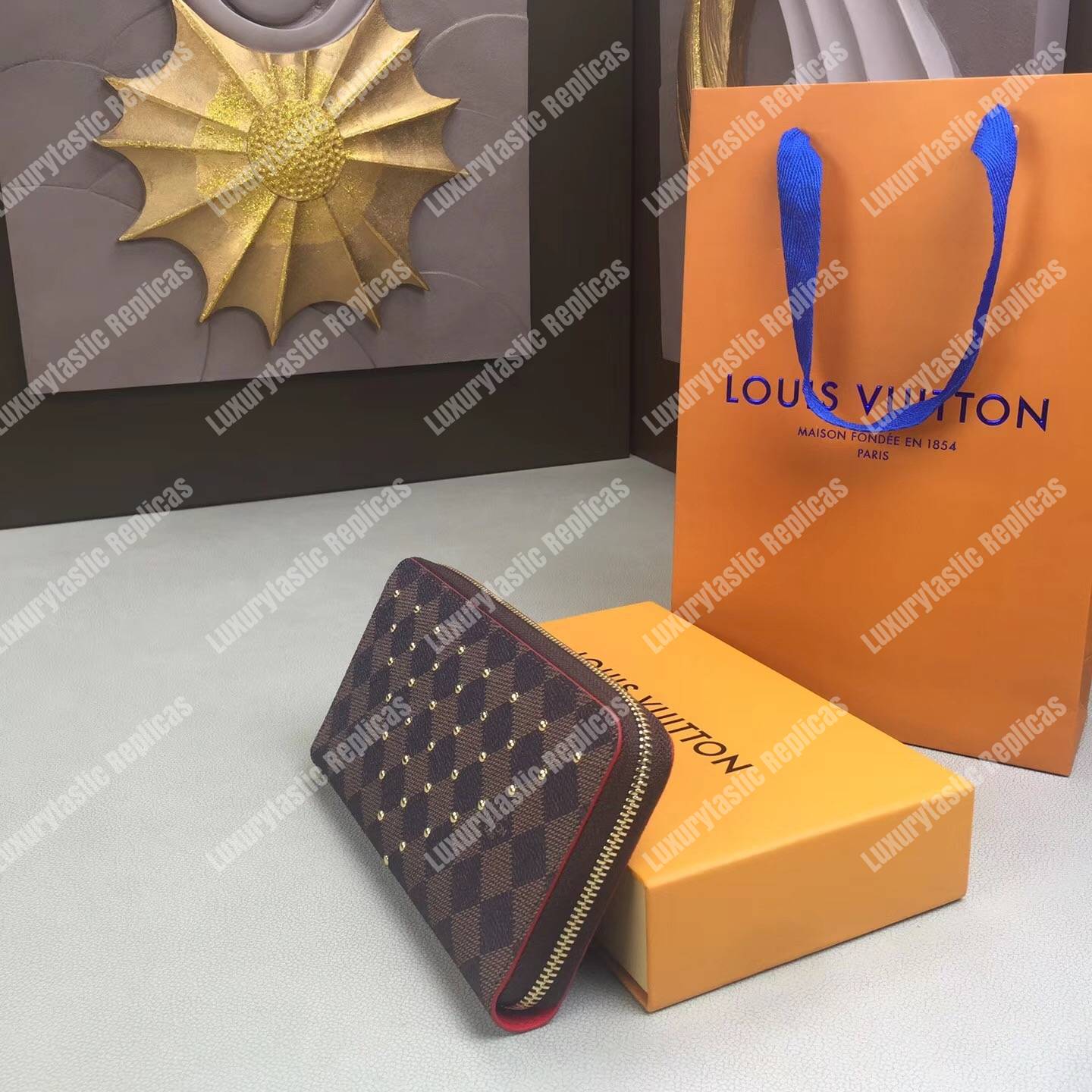 LV Zippy Wallet Damier Ebene Gold Studs