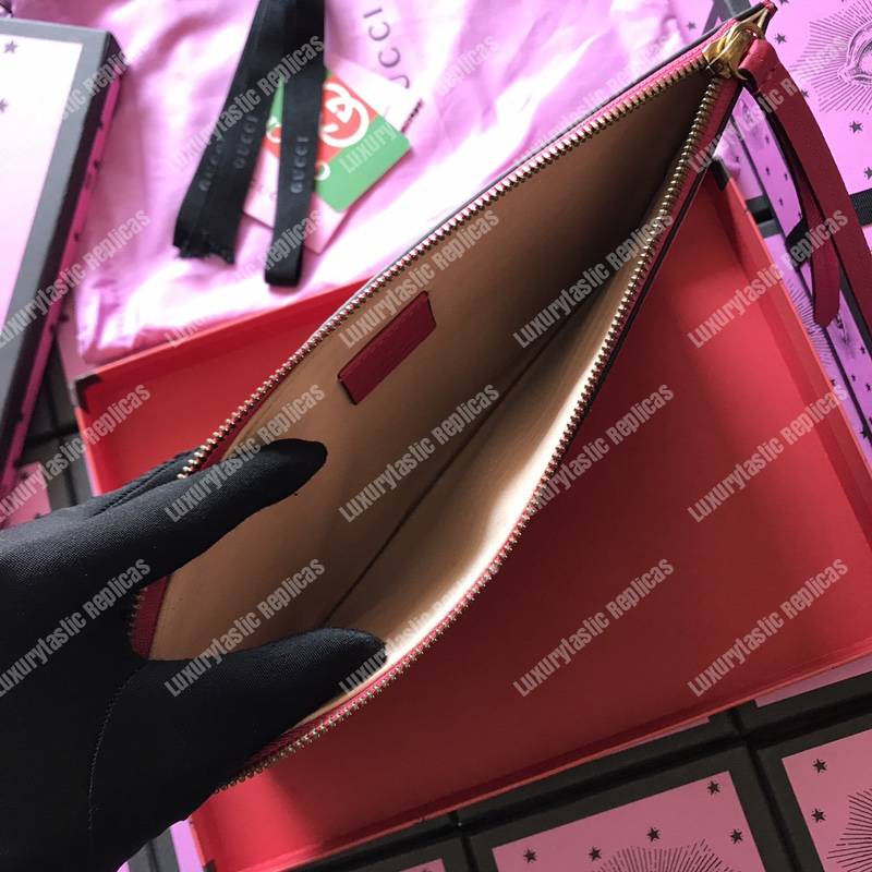 G*u*i leather pouch with butterfly red