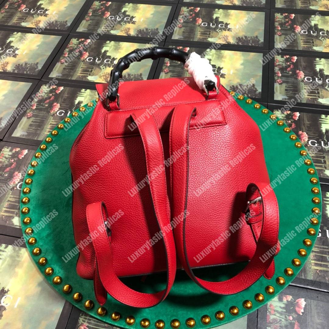 G*u*i leather bamboo tassel backpack hibiscus red