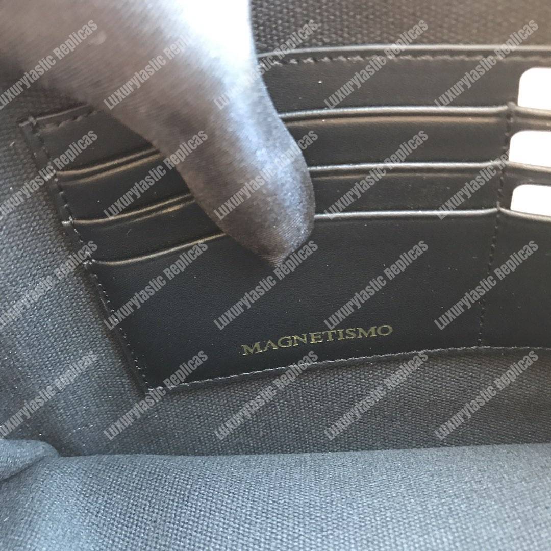 g*u*i G*u*iy print leather pouch bag black