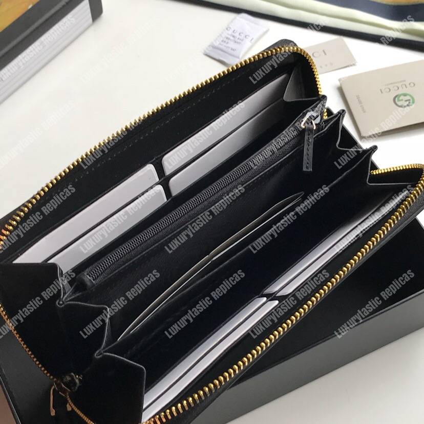 G*u*i leather zip around wallet with G*u*i logo