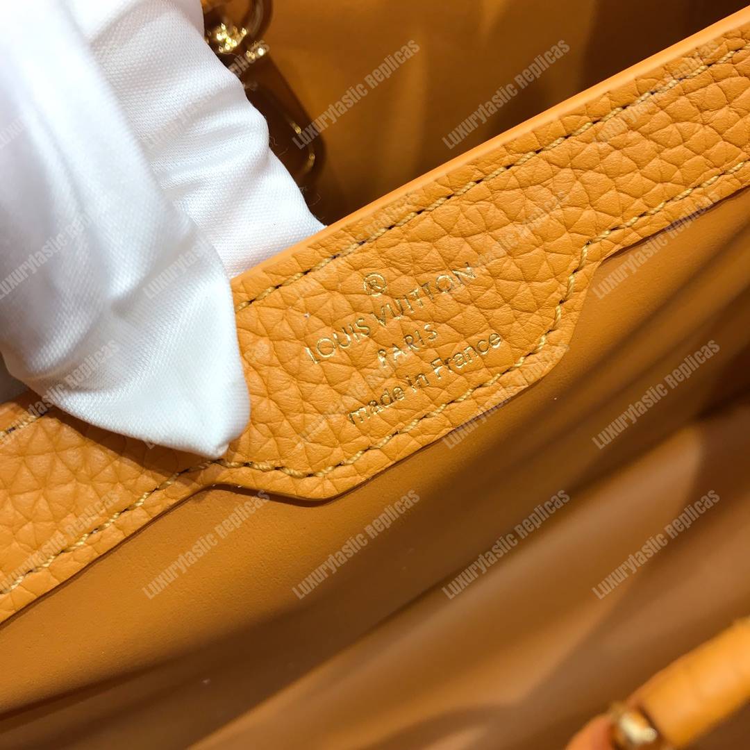 LV Capucines PM Taurillon Leather Ocre