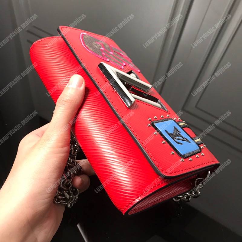 LV Twist Chain Wallet Epi Leather Travel and Trunk-Making Heritage Red