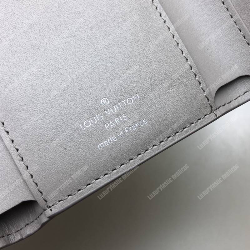 LV Capucines Compact Wallet Taurillon Magnolia Leather Monogram Flowers