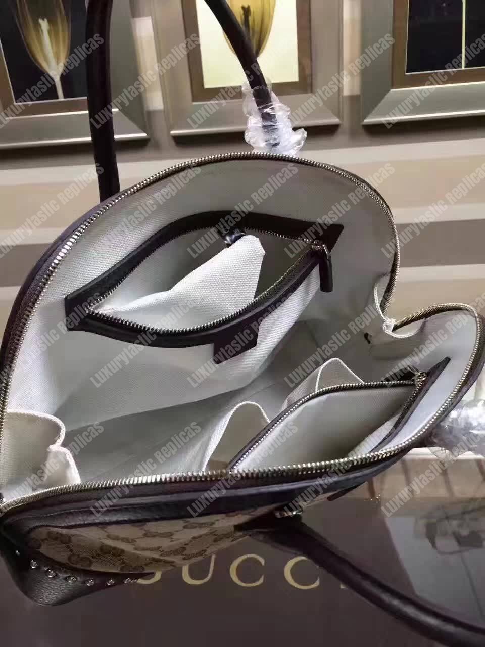 G*u*i gg canvas top handle bag black