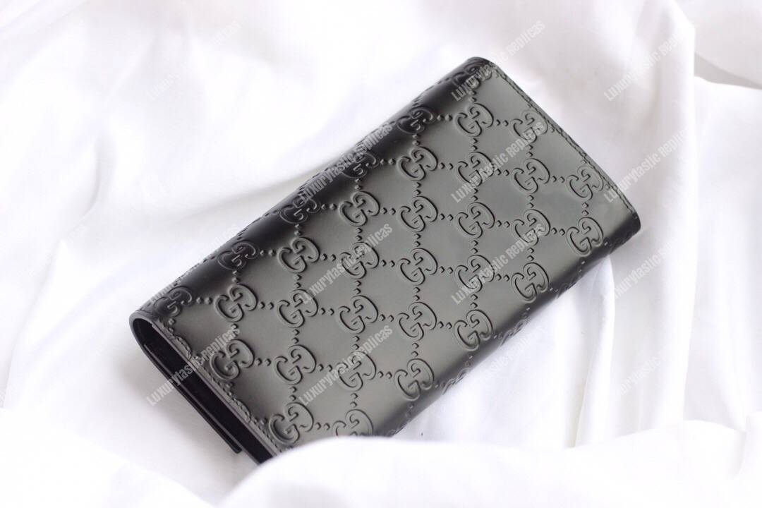 G*u*i signature continental wallet with cat