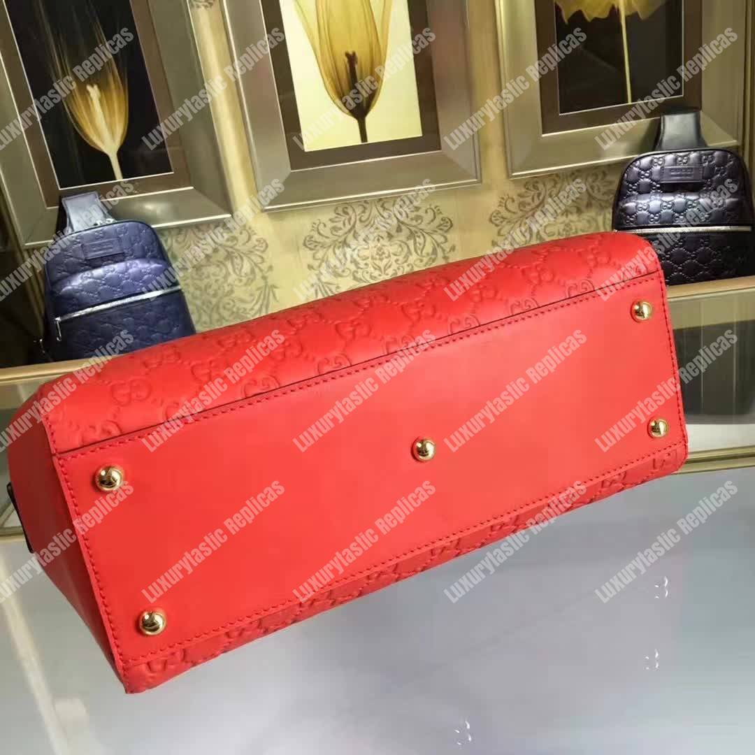 G*u*i signature medium top handle bag red