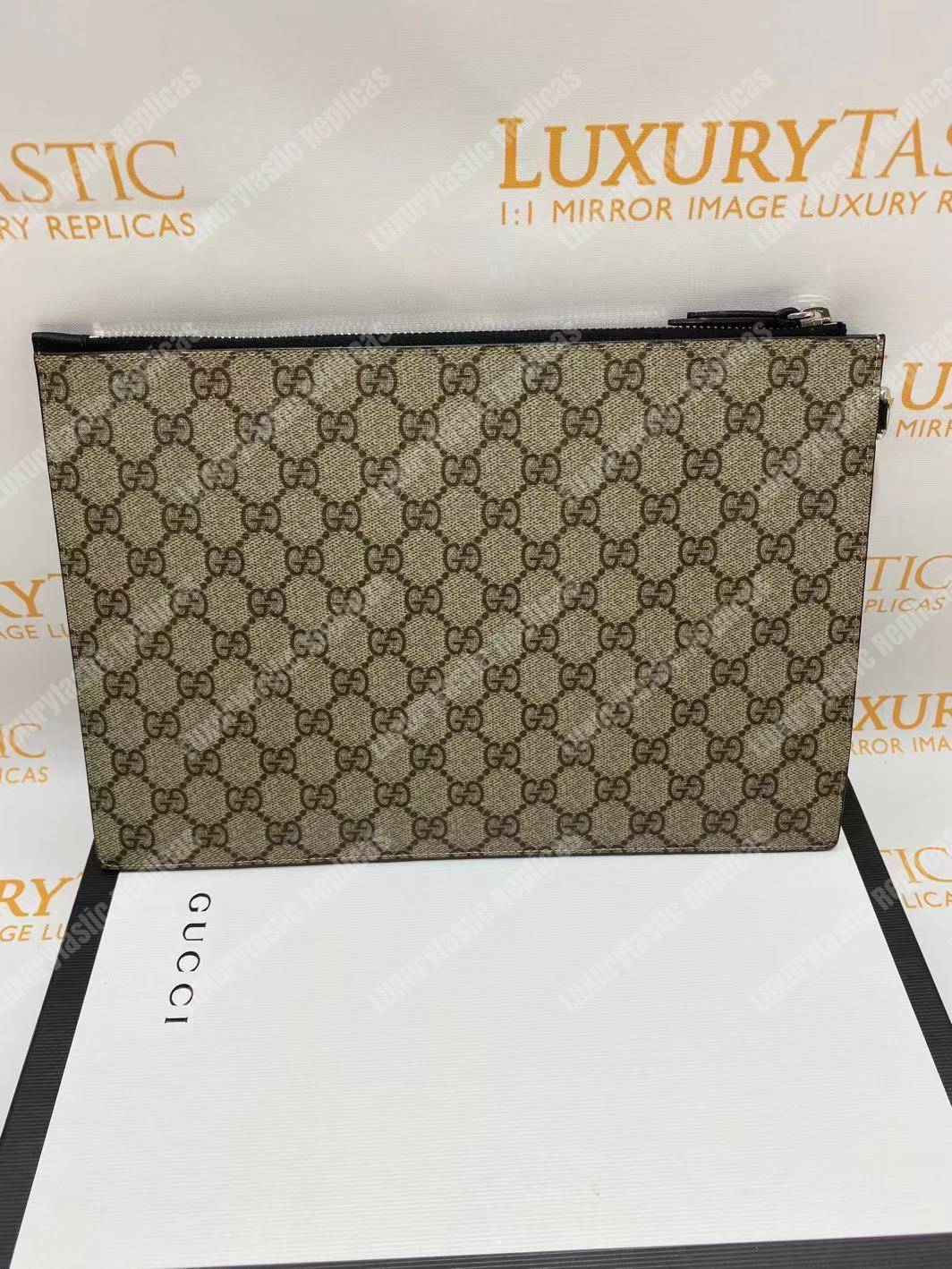 G*u*i tiger print gg sup*e clutch pouch