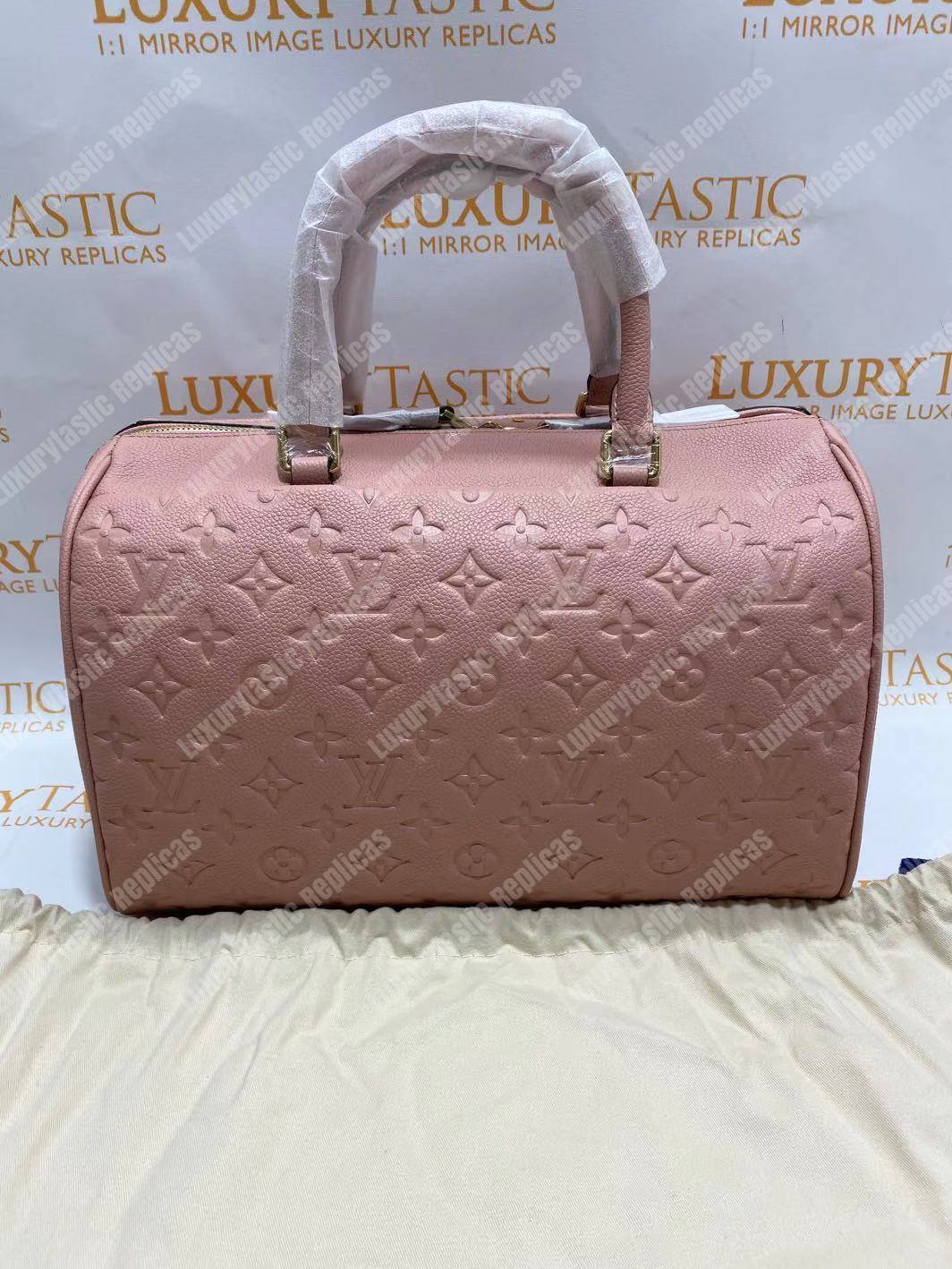 LV Speedy Bandouliere 30 Monogram Empreinte Leather Rose Poudre