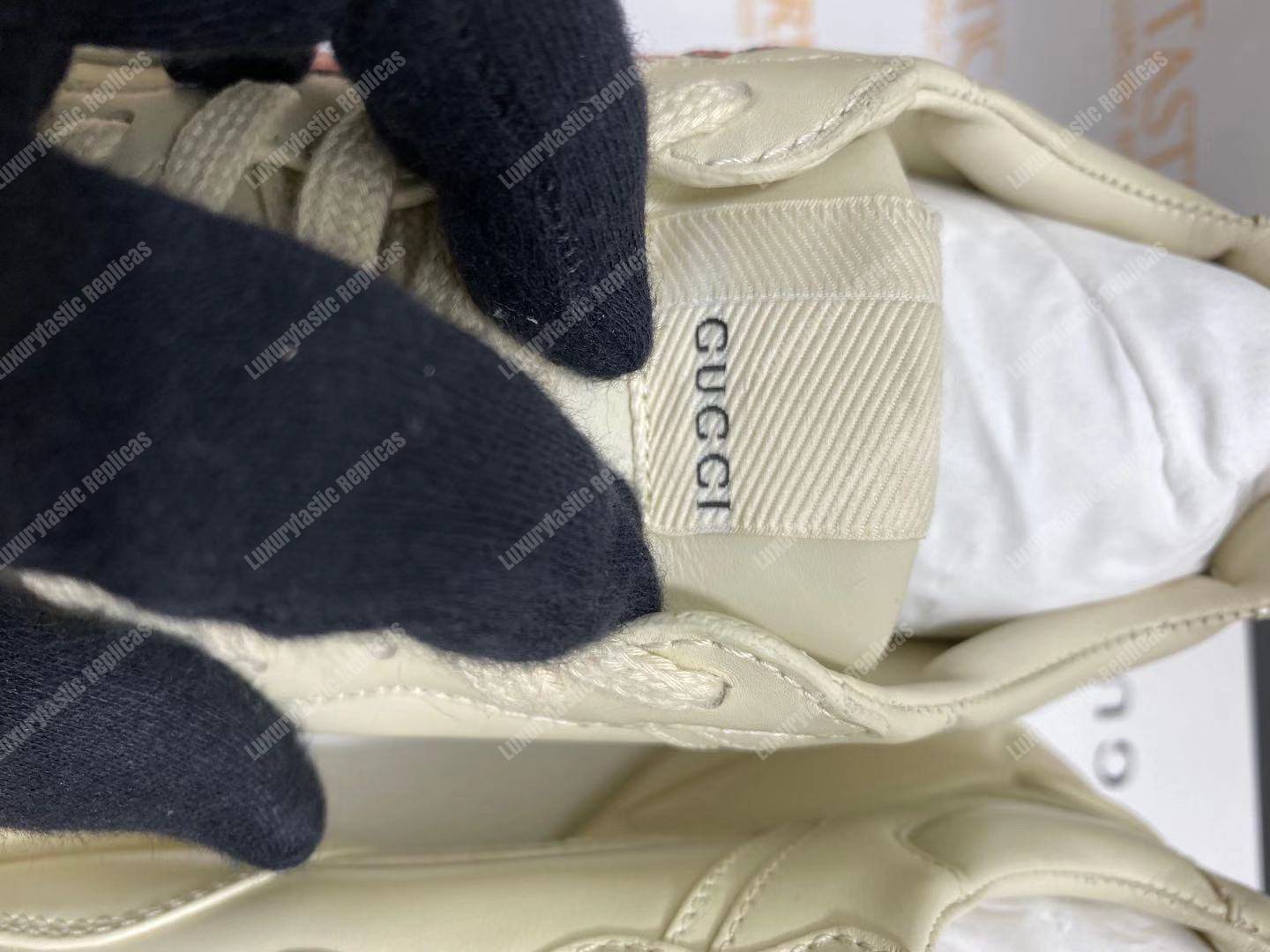 G*u*i rhyton sneaker with mouth print