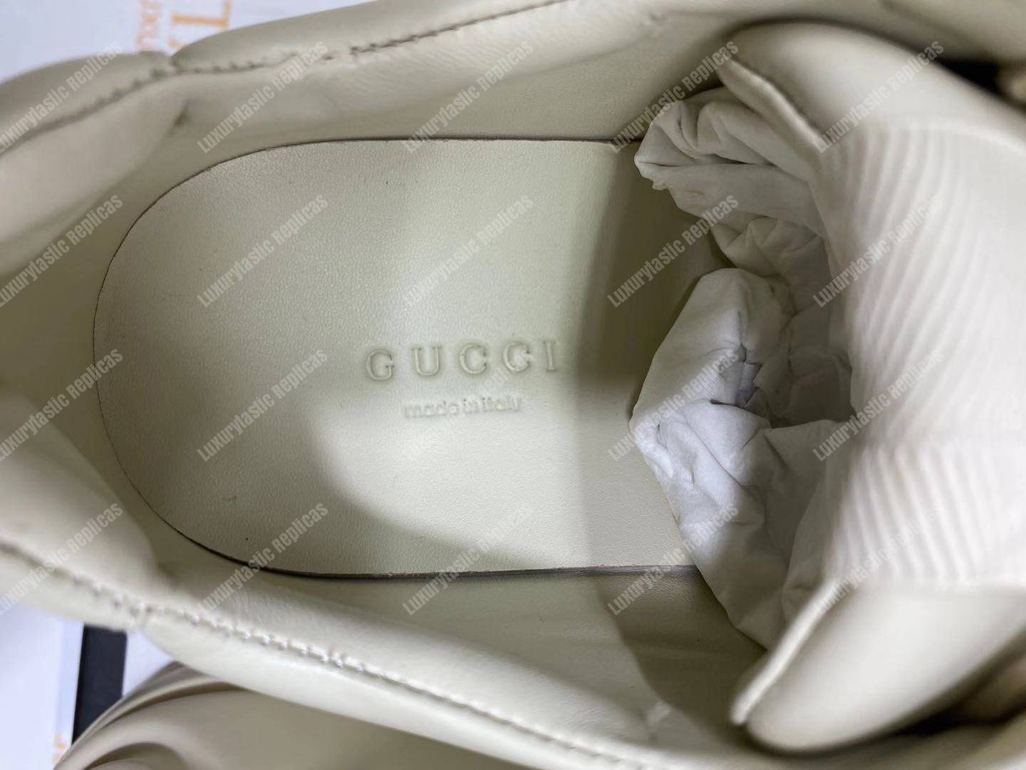 G*u*i rhyton sneaker with mouth print