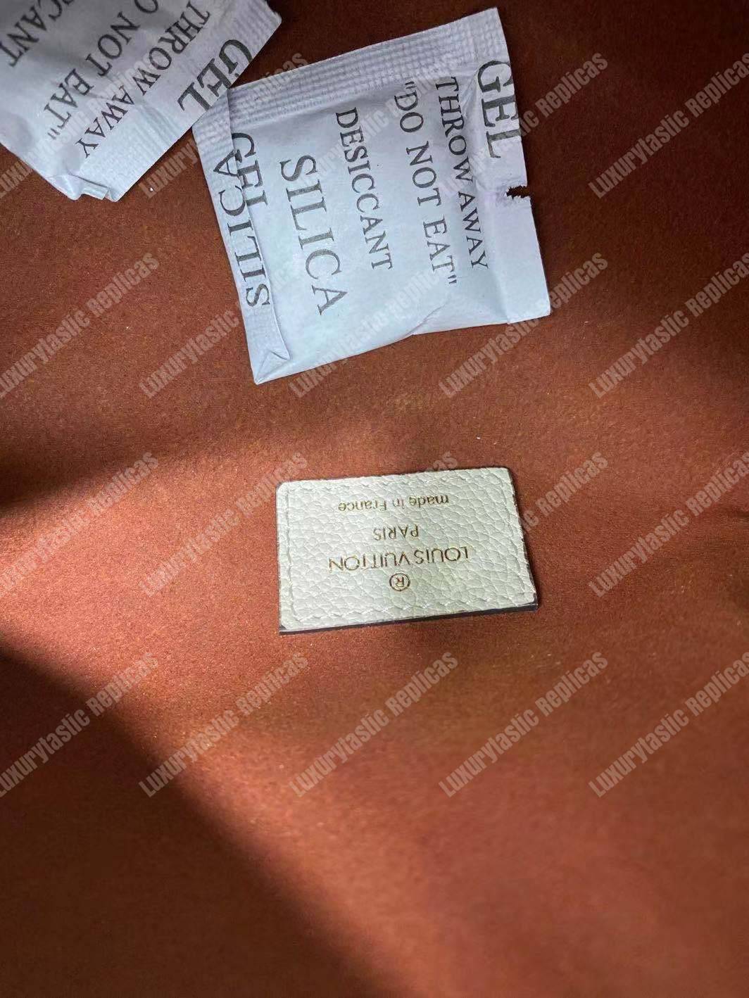 LV Monogram Empreinte Bumbag Creme Beige