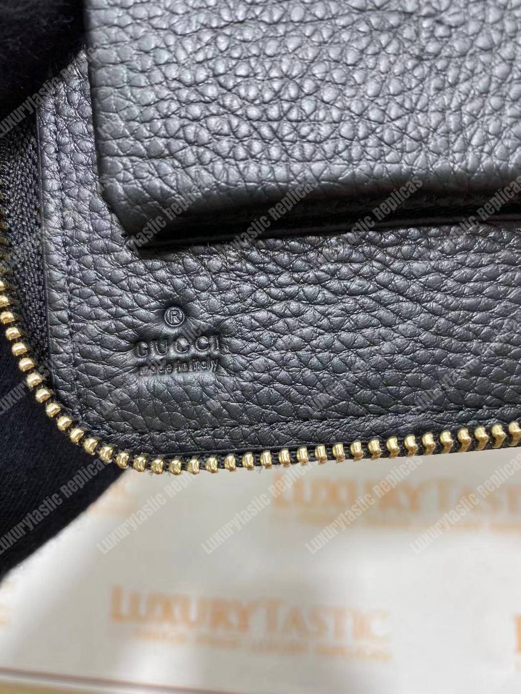 G*u*i pebbled calfskin soho travel document case black