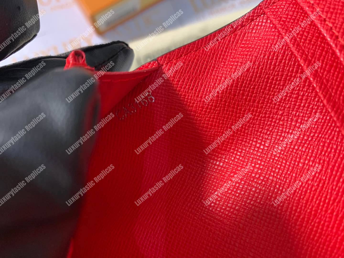 l**is V*t*n x sup*e brazza wallet epi red