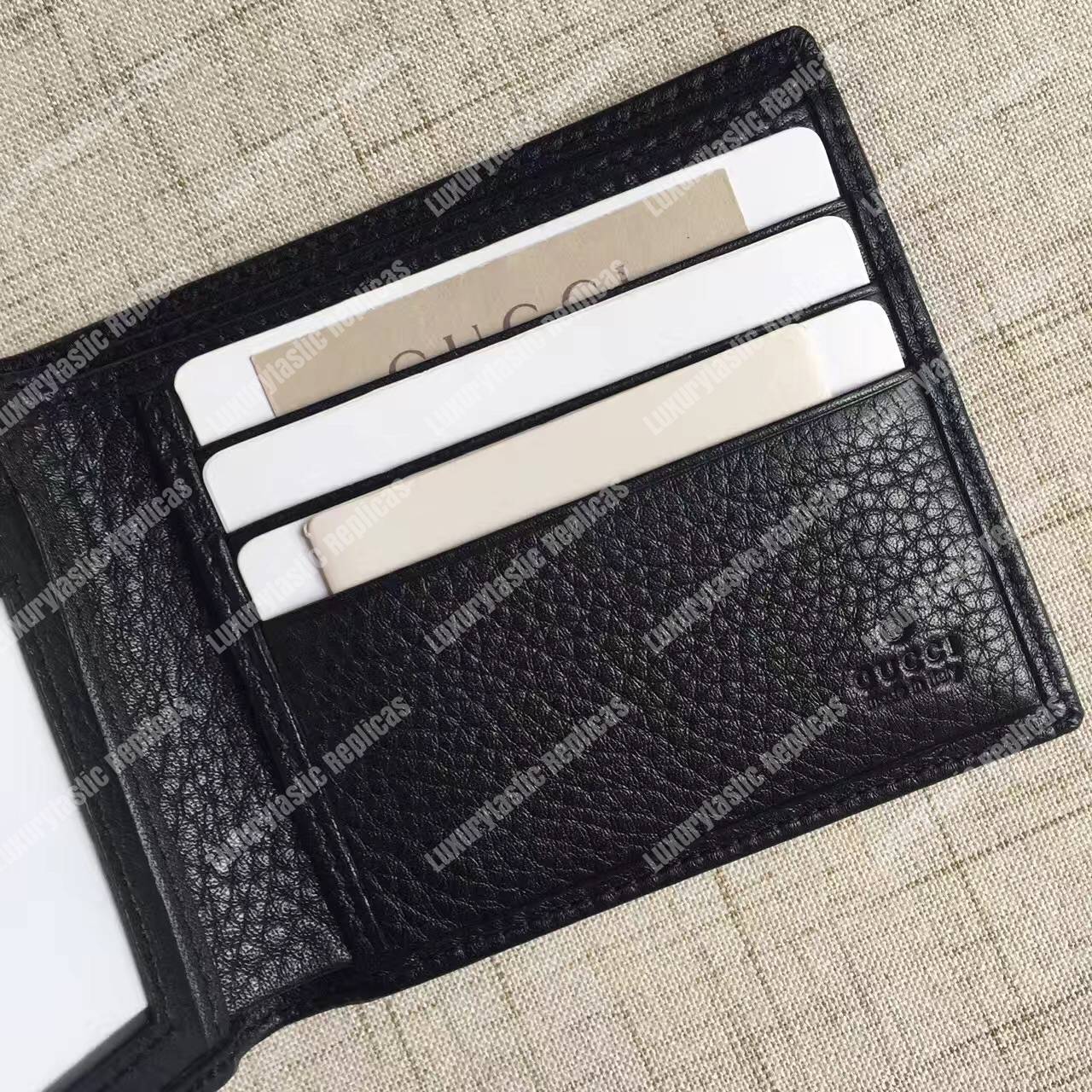 G*u*i leather bi-fold wallet black