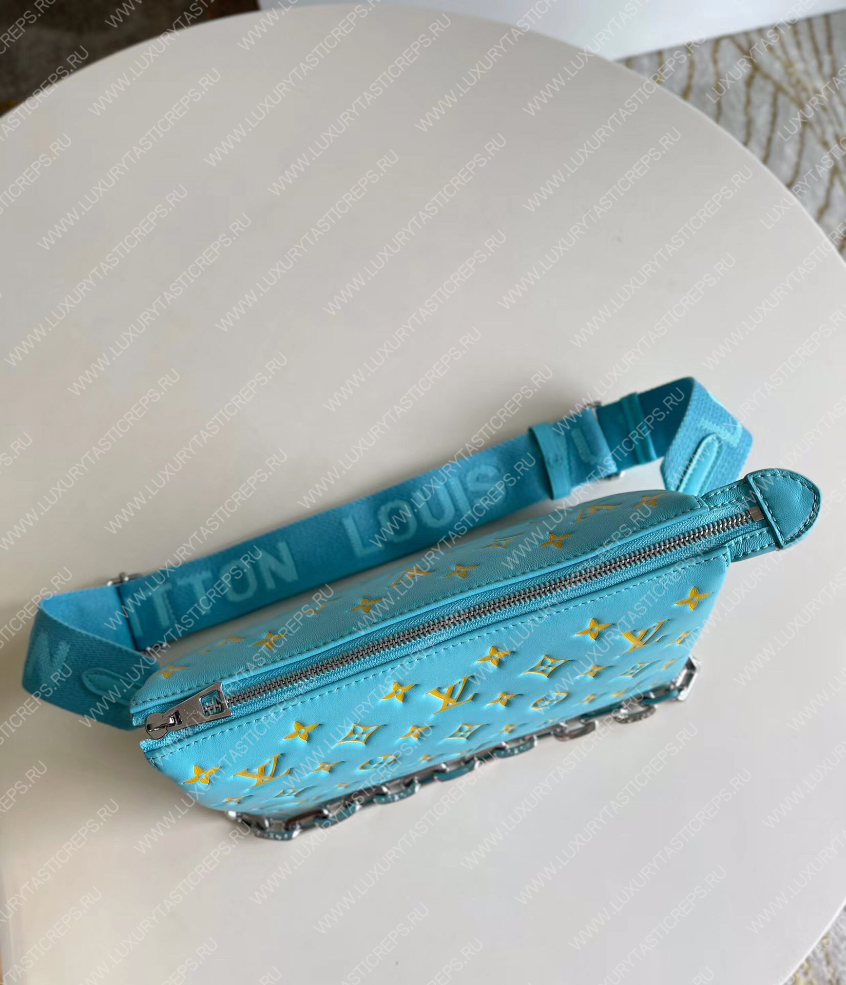 l**is V*t*n coussin pm turquise m57793