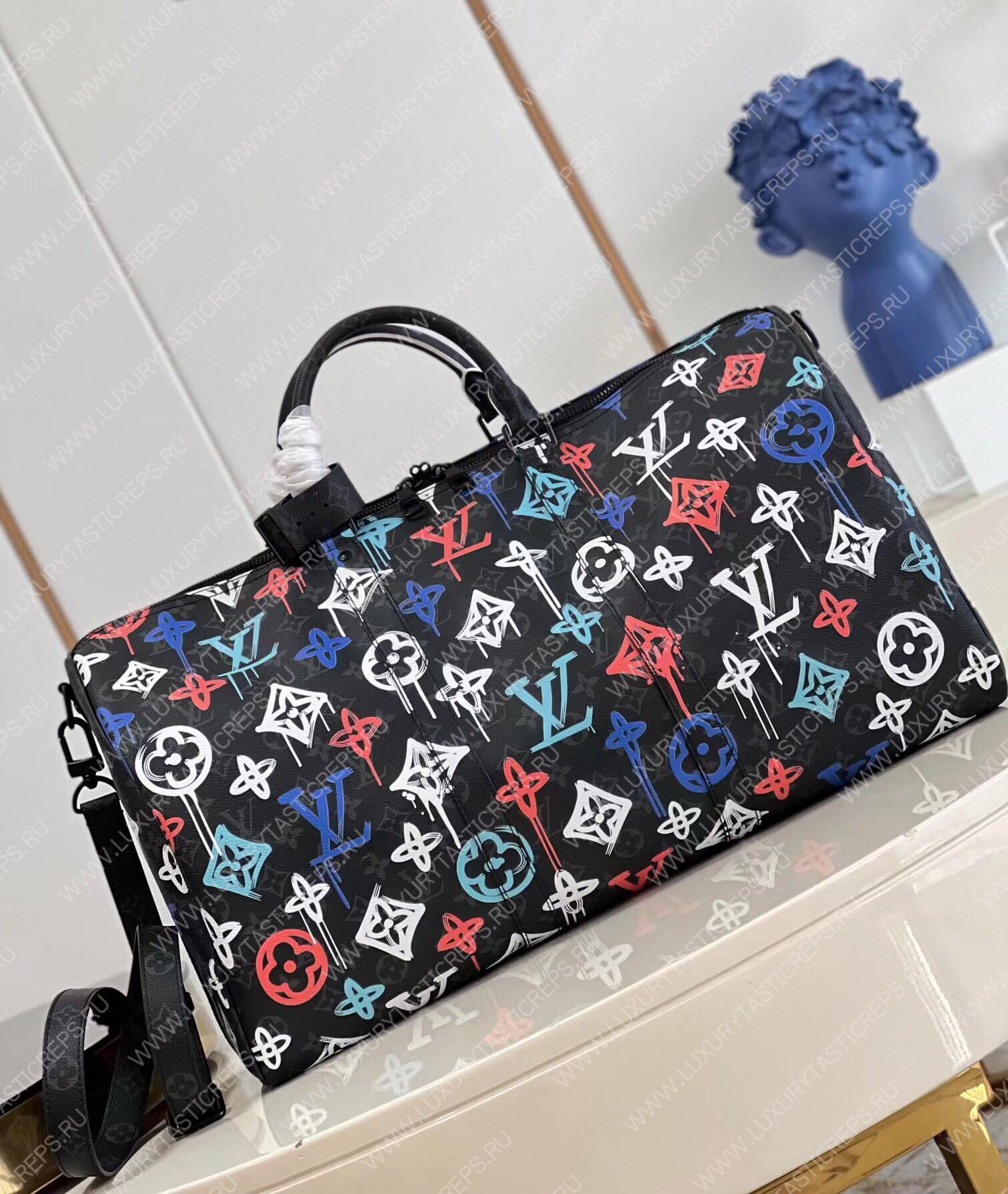 KEEPALL BANDOULIÈRE 50 GRAFFITI ORANGE