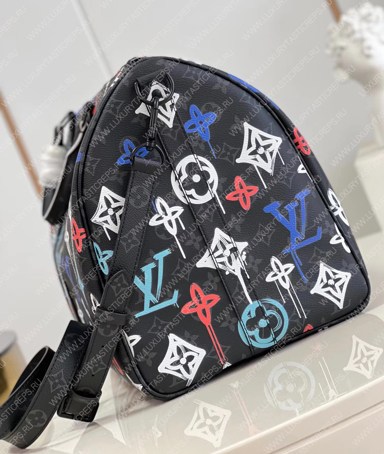 KEEPALL BANDOULIÈRE 50 GRAFFITI ORANGE