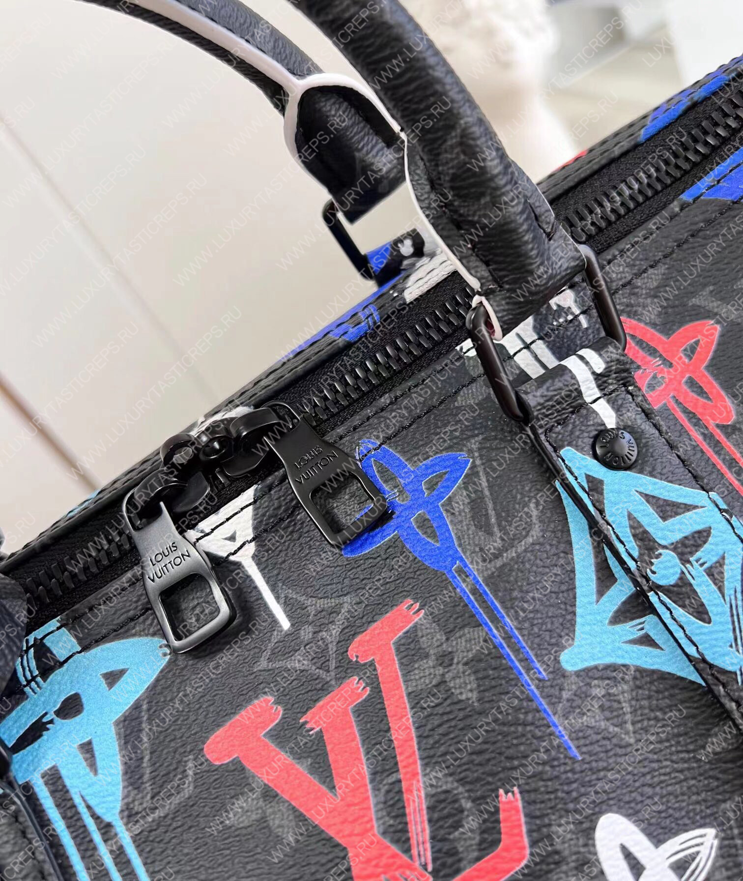 KEEPALL BANDOULIÈRE 50 GRAFFITI ORANGE