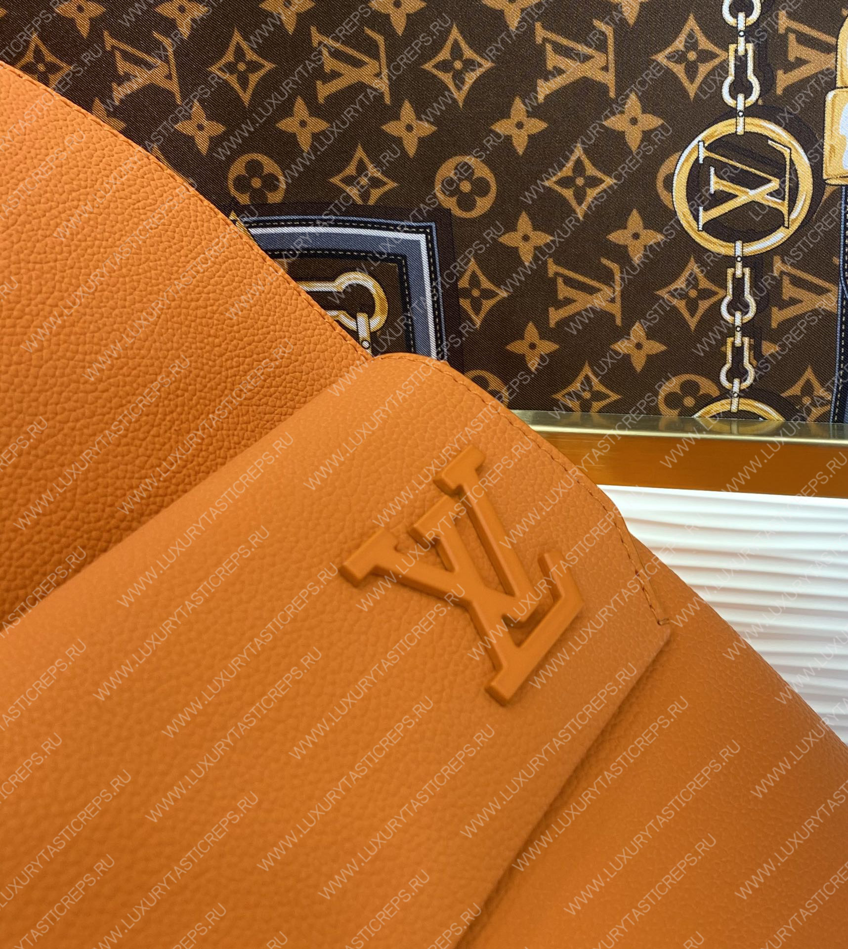 l**is V*t*n takeoff backpack orange m57079
