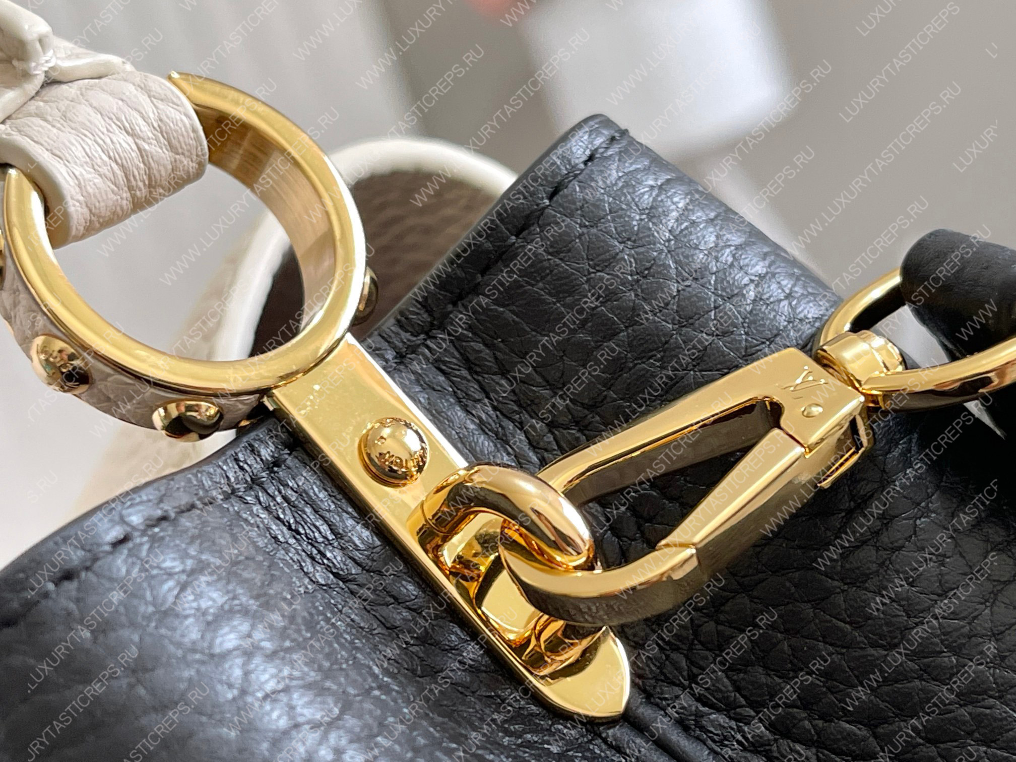 l**is V*t*n capucines bb black m21043