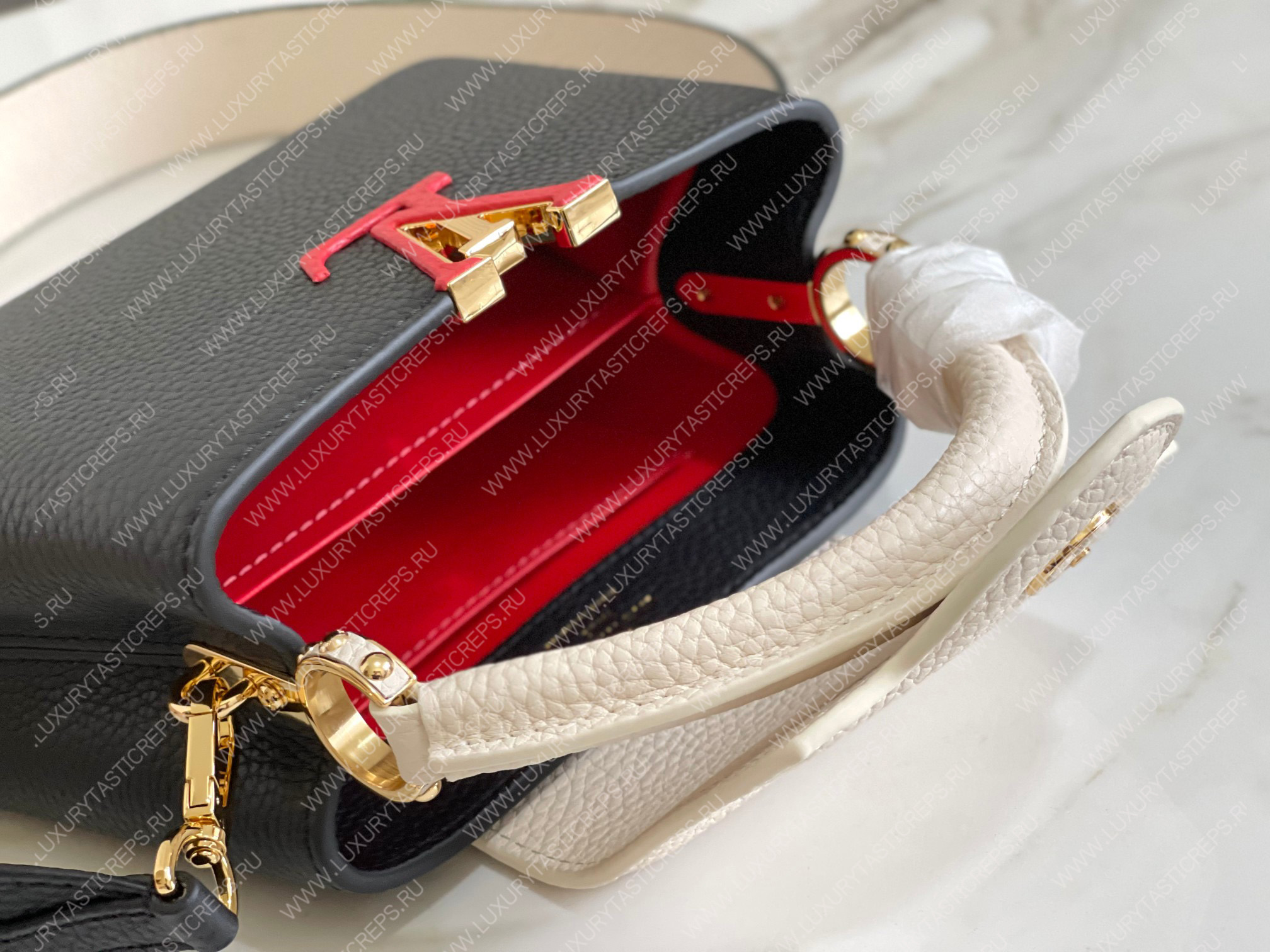 l**is V*t*n capucines bb black m21043