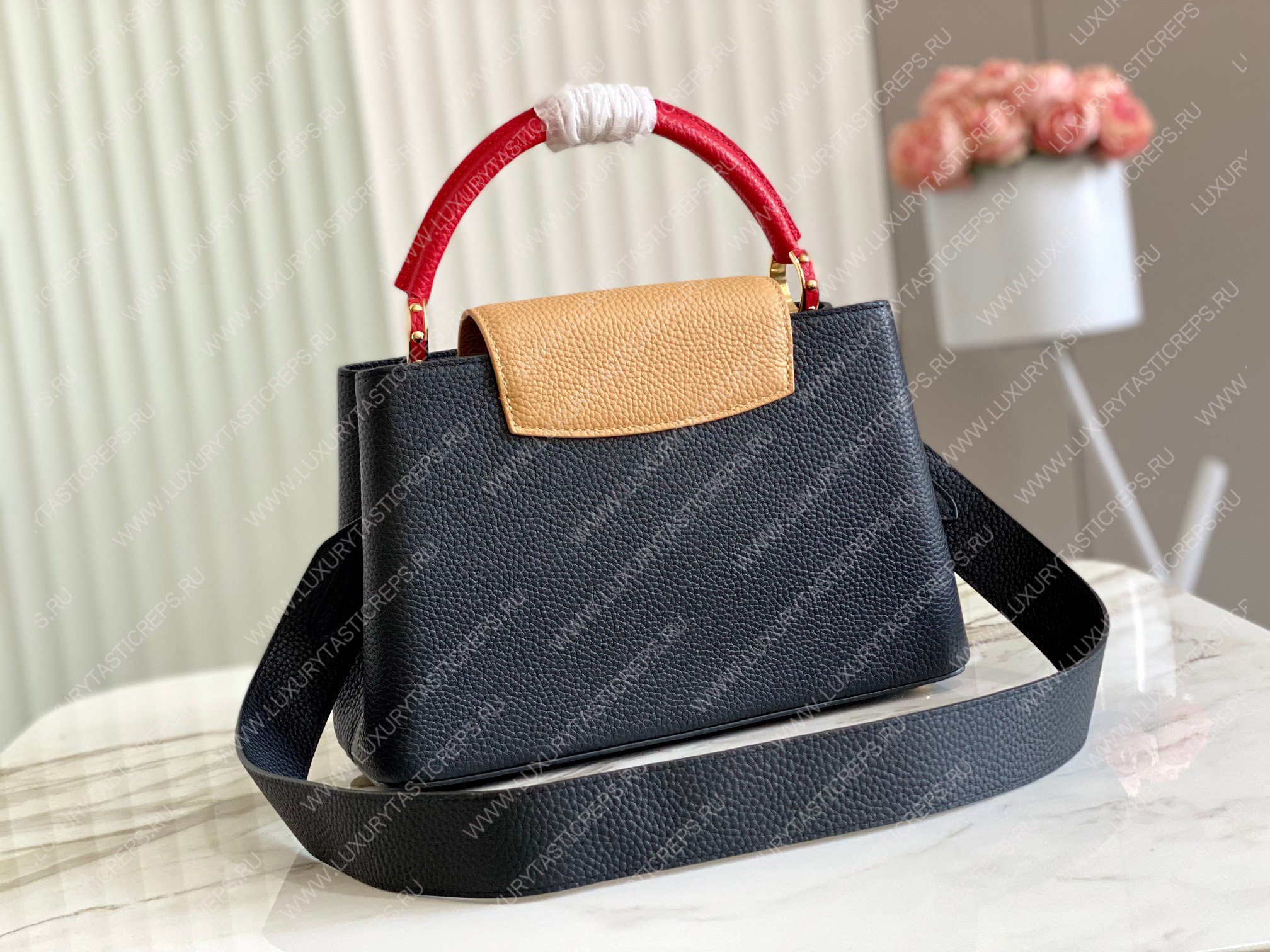 l**is V*t*n capucines mm black m20704