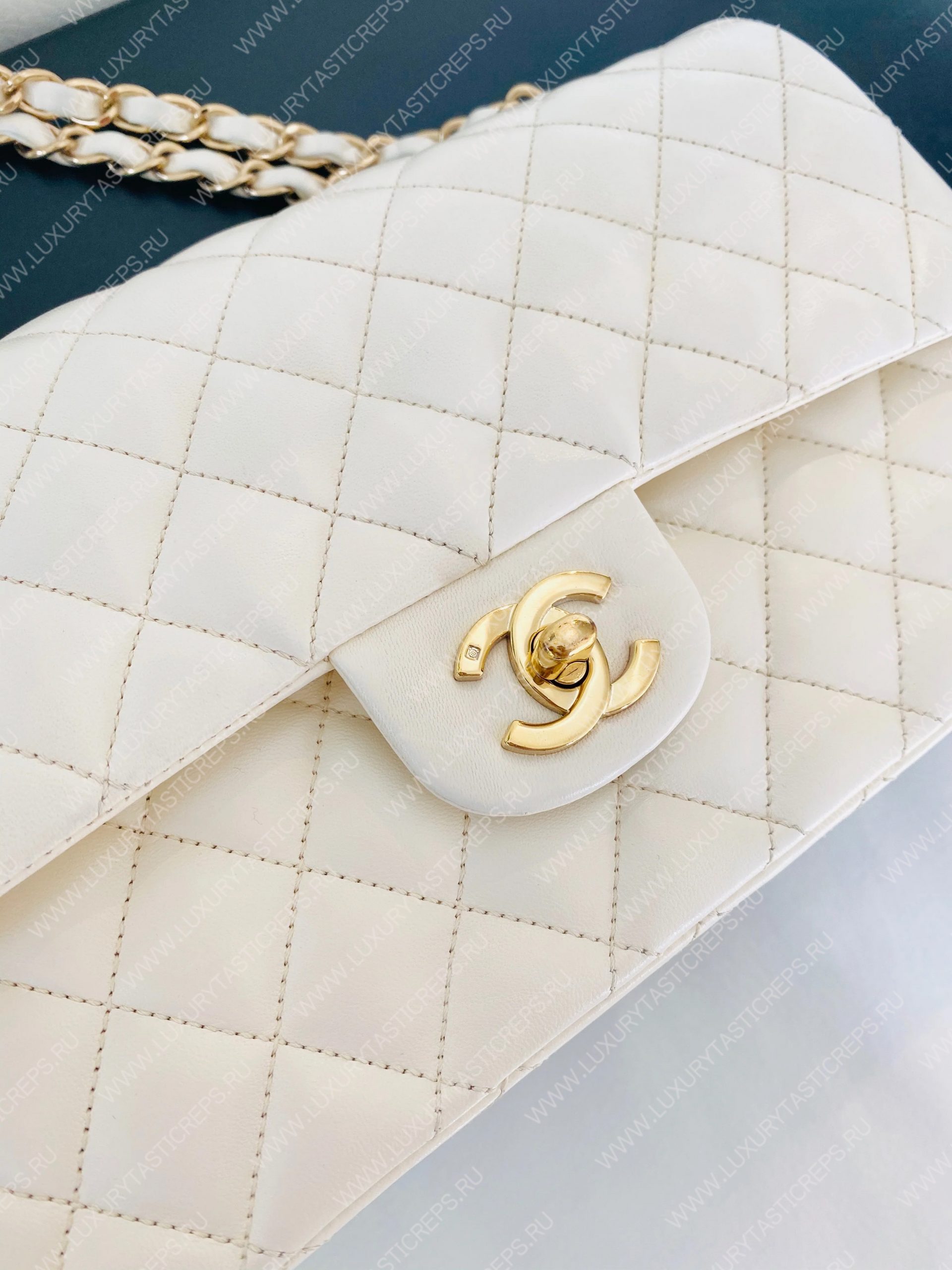 Ch*el classic flap bag white a58600