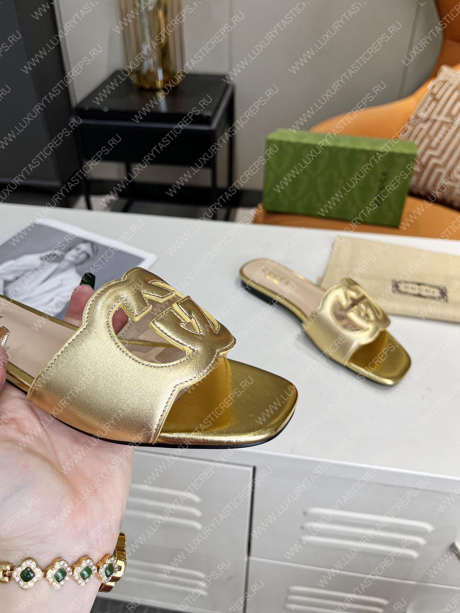 G*u*i interlocking g cut-out slide sandal gold 694451