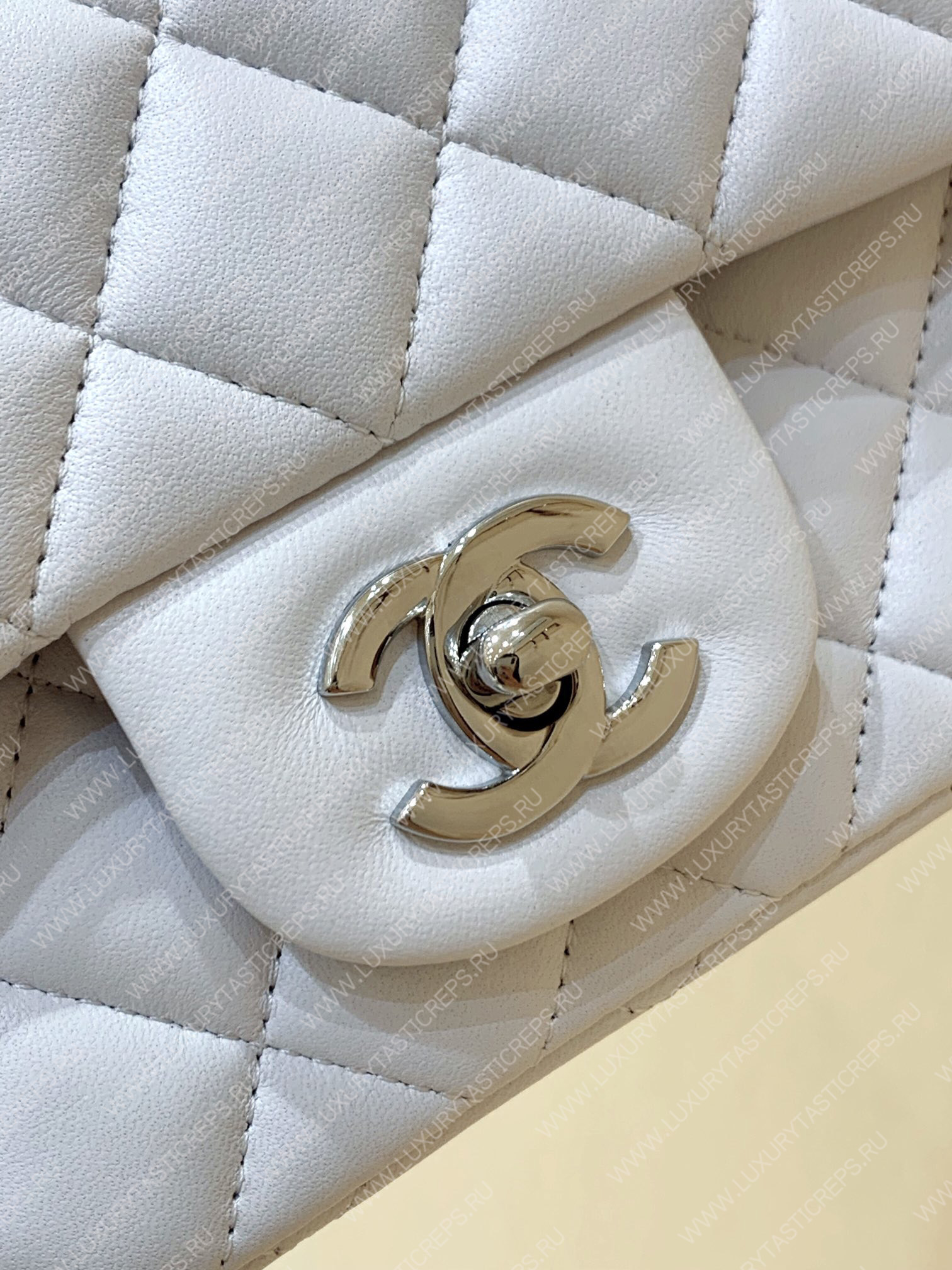 Ch*el mini classic flap bag white a01115