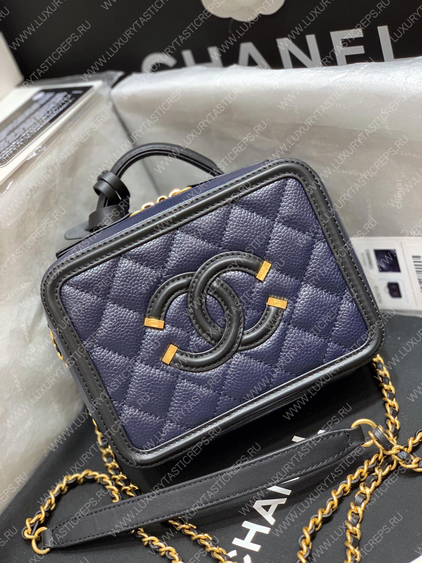 Ch*el vanity case black and blue a93342