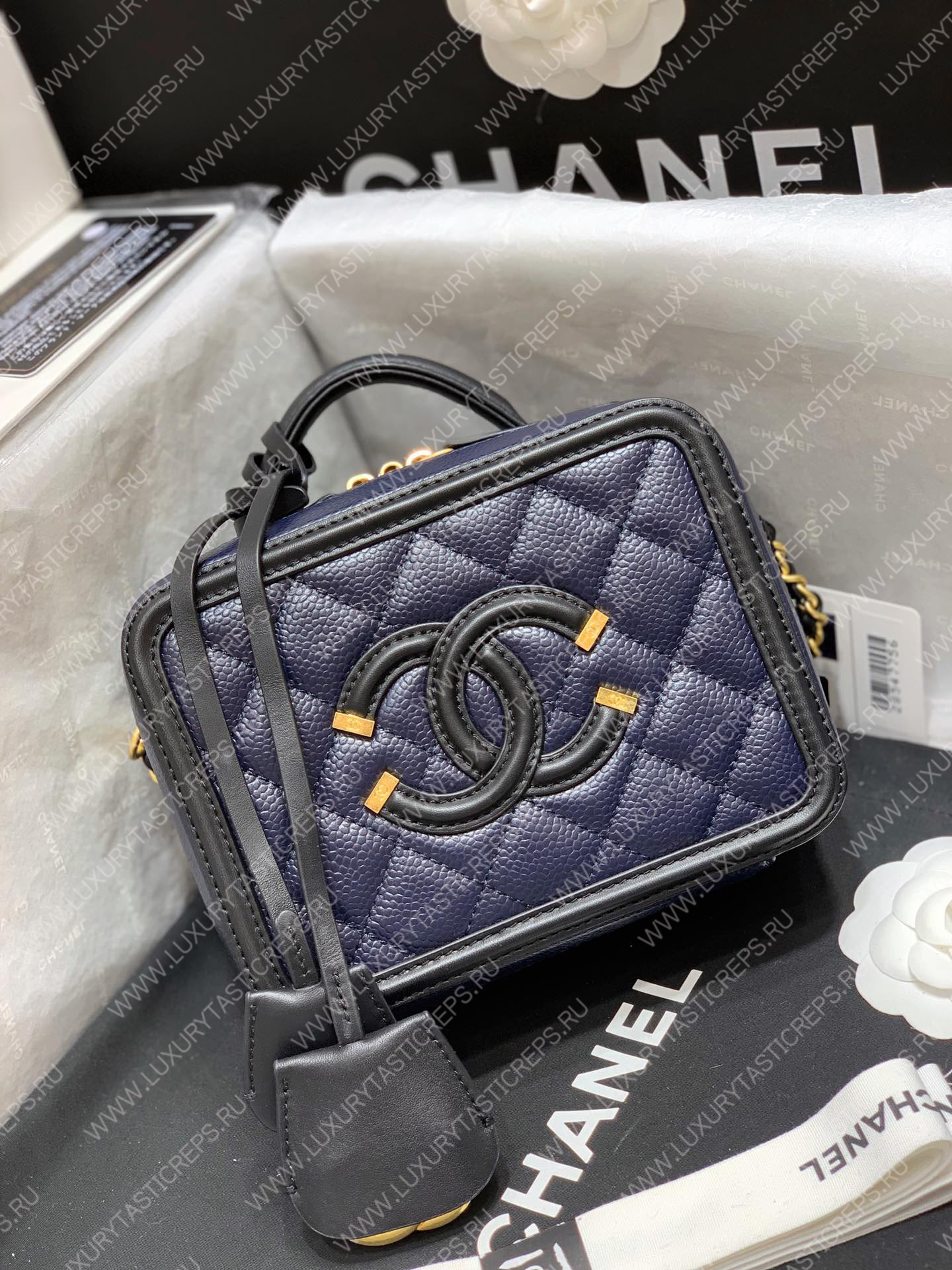 Ch*el vanity case black and blue a93342