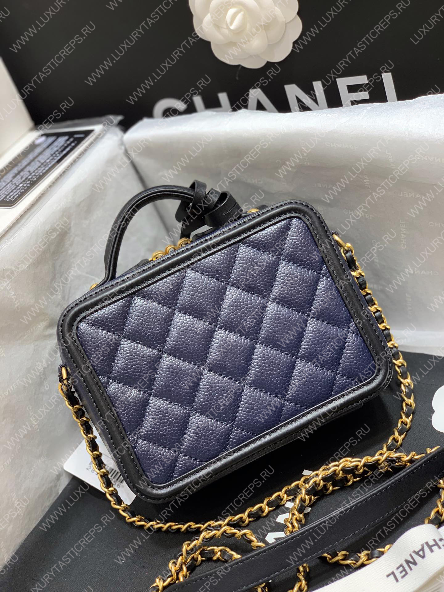 Ch*el vanity case black and blue a93342