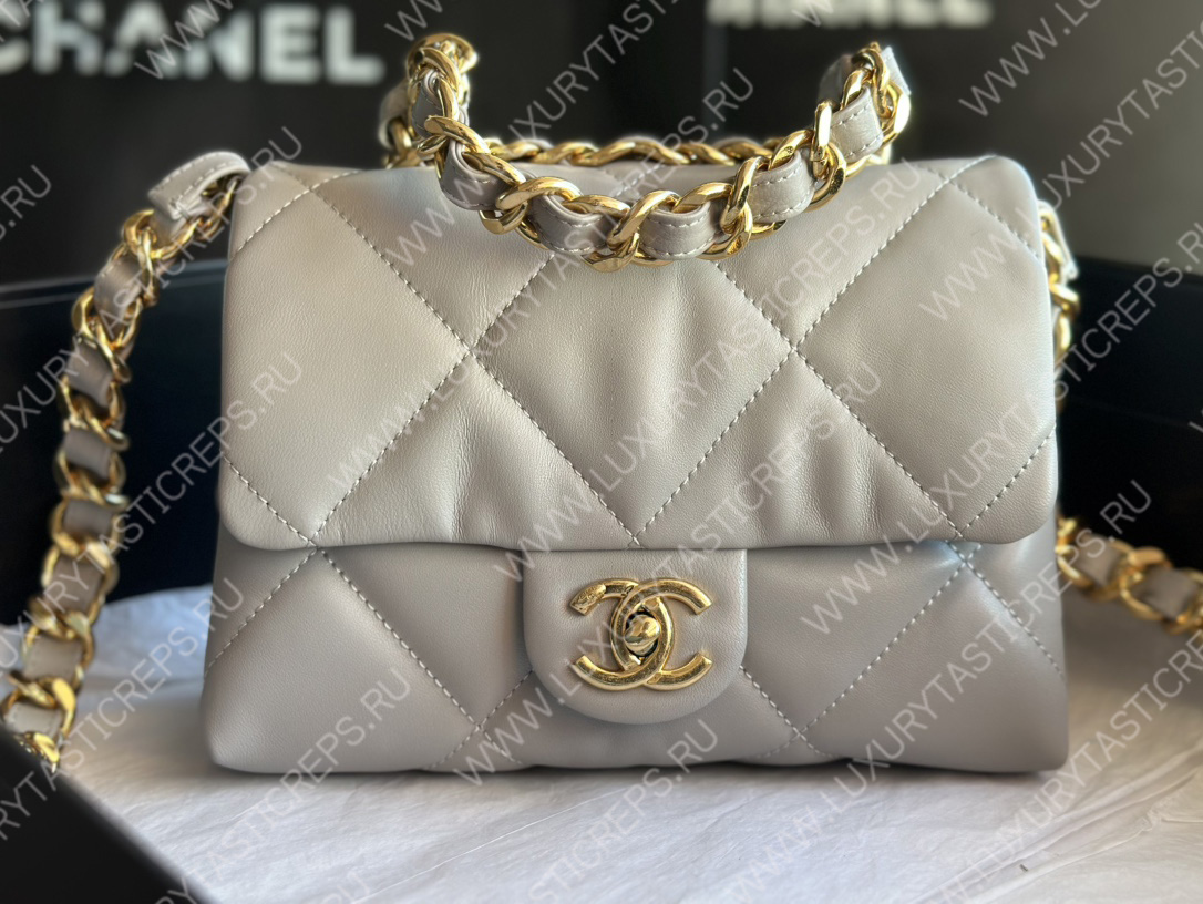 Ch*el pearl crush mini flap bag white as1160